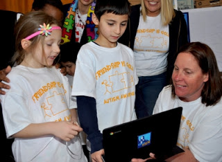 Real estate firm donates 10 laptop computers to Boston school’s autism program. (March 2017)