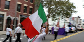 Columbus Day Parade: Community-wide effort ensures another successful event as weather holds for marchers, bands and community groups ItalianFlag