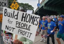 Protesting over-development of luxury housing, Stand Up For Eastie takes to the streets