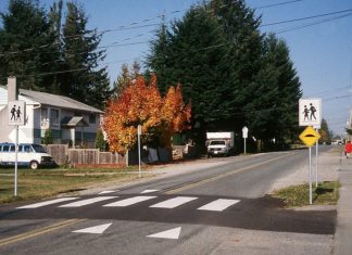 Matt Robare: Taking it to Wu’s streets: Bike lanes, sidewalks and free buses for a walkable city Raised Sidewalk