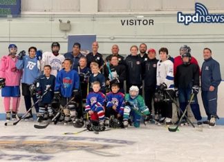 Community Service Officers Kick Off Hockey Skills Sessions at the Porazzo Skating Rink in East Boston