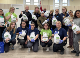 East Boston Neighborhood Health Center hands out 300 turkeys to community members East Boston