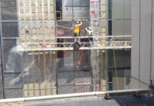 Massachusetts unemployment down to 2.9%; employment up by 6,300 jobs Stock Photography Construction Workers Boston July 2022