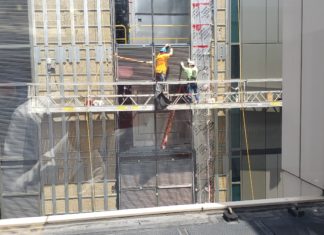 Massachusetts unemployment down to 2.9%; employment up by 6,300 jobs Stock Photography Construction Workers Boston July 2022