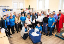NeighborHealth brings holiday cheer through food distribution NeighborHealth East Boston 2024