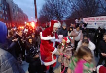 Santa arrives on the East Boston Greenway