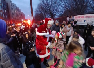 Santa arrives on the East Boston Greenway