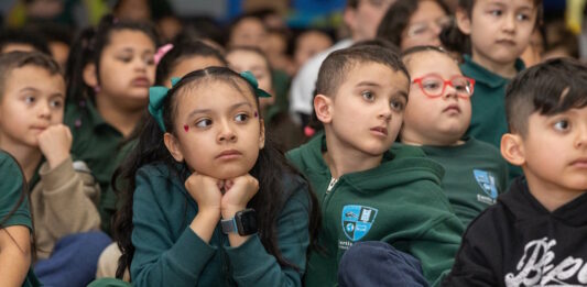 Guild School hosts Scholastic’s United States of Readers East Boston Learning