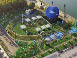 A big soccer ball is coming to East Boston’s waterfront Aerial view of a waterfront festival with white tents, a circular lawn, a large blue inflatable stage, seating areas, and a water feature.
