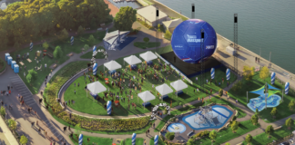 A big soccer ball is coming to East Boston’s waterfront Aerial view of a waterfront festival with white tents, a circular lawn, a large blue inflatable stage, seating areas, and a water feature.