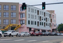 Bicycle advocates upset with city revision to traffic calming by behemoth housing project in congested neighborhood.