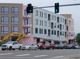 Bicycle advocates upset with city revision to traffic calming by behemoth housing project in congested neighborhood.