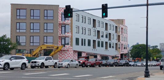 Bicycle advocates upset with city revision to traffic calming by behemoth housing project in congested neighborhood.