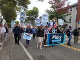Behind in polls, Minogue voices confidence and touts early voting